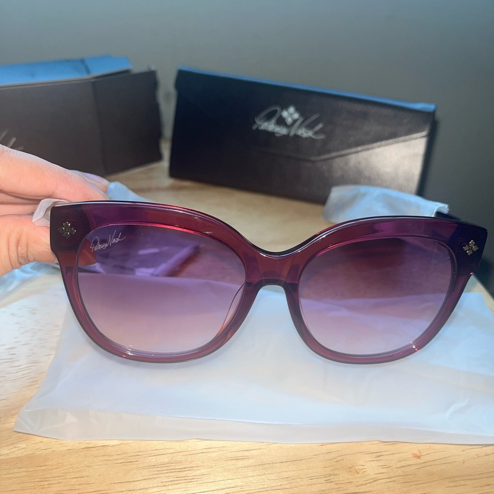Women’s sunglasses in wine